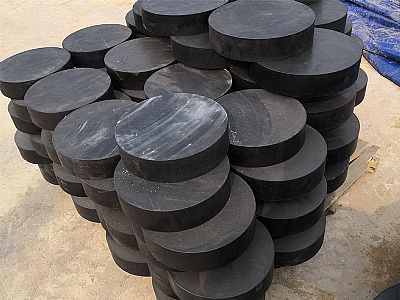 酉阳县板式橡胶支座由若干层橡胶片与薄钢板经加压硫化
